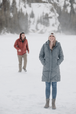 Gif of Michael and Amanda running in the snow