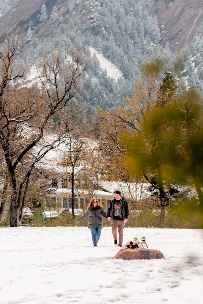 walking through the snow couple