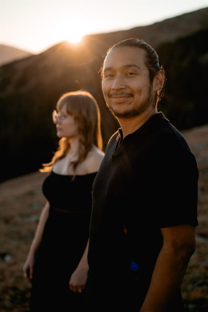 couple on trail ridge road in the mountains