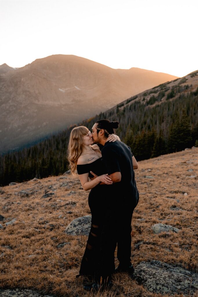 couple on trail ridge road in the mountains